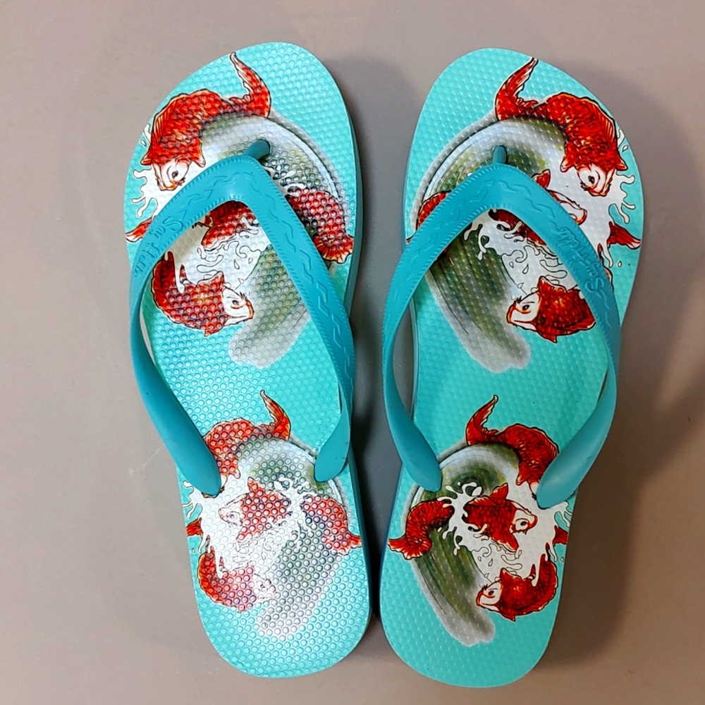 Size 10 ladies flip flops. Say Hello brand Mint green with red fishes